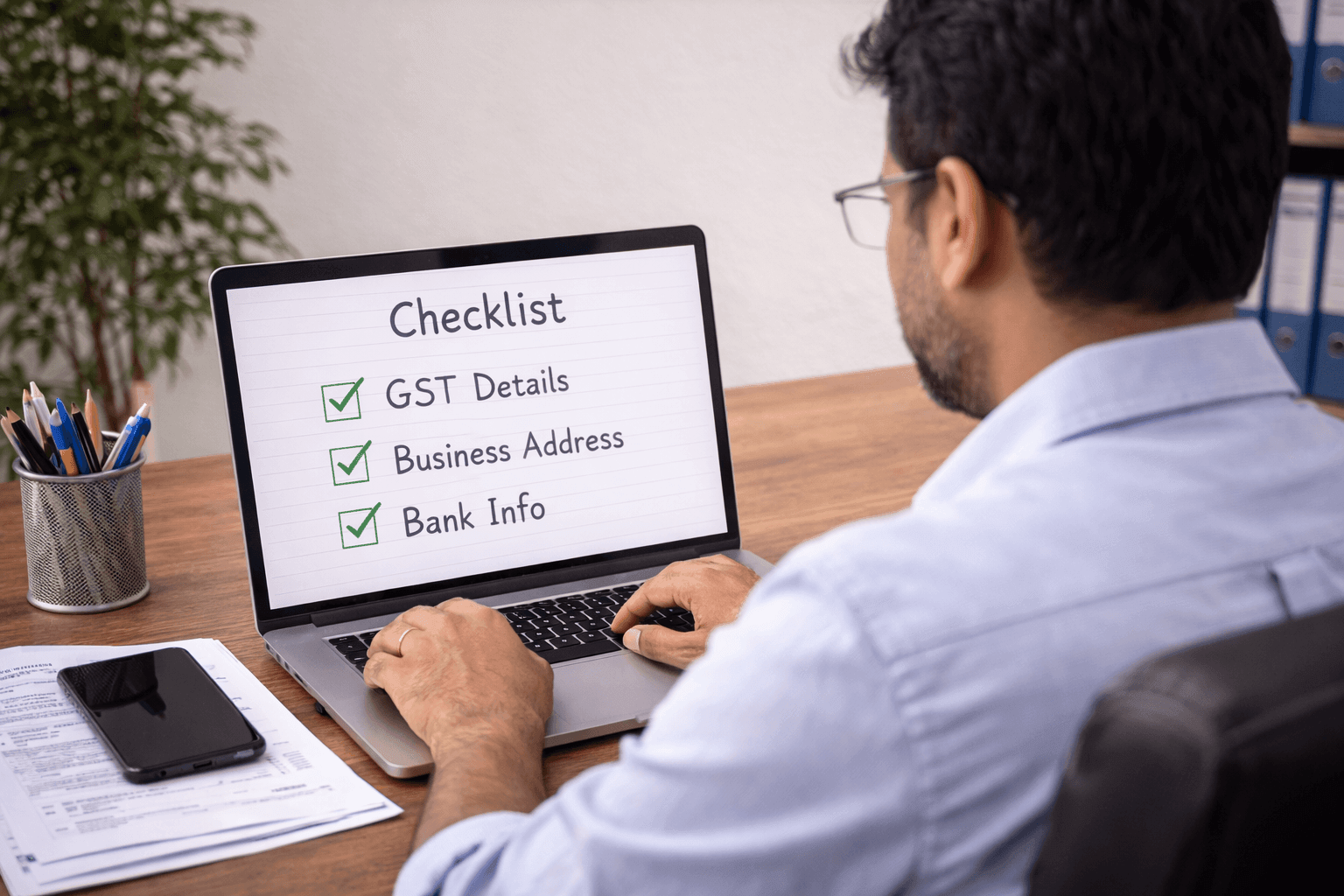 Udyam registration verification checklist online Person checking Udyam registration verification checklist on laptop screen